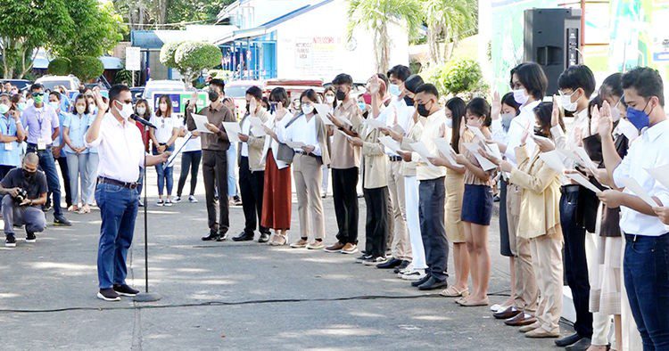 SOME of the 48 students who passed the written and oral examinations for the city youth officials program as they take their oath of office with Mayor Nelson Legacion as administering officer. The program gives opportunity to the youth to handle the operations of the city government except in policy determining or requiring monetary disbursements.