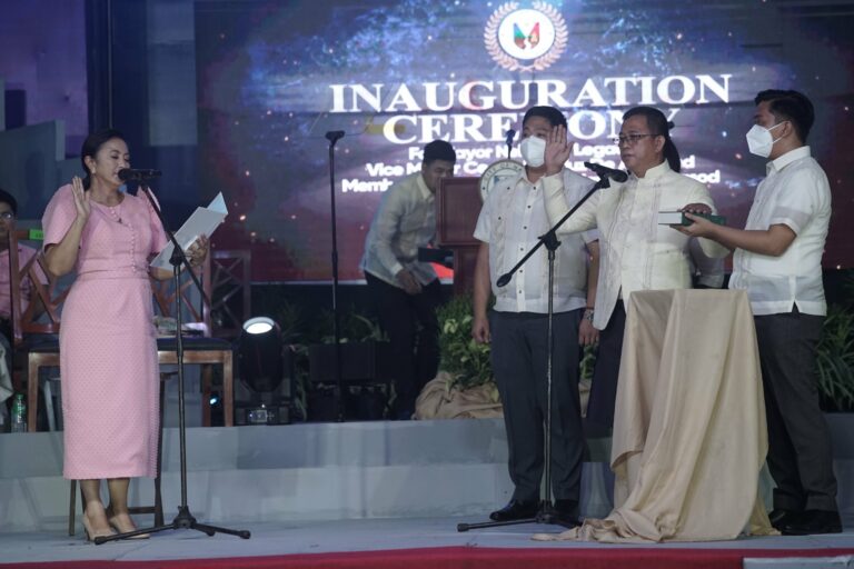 Mayor Nelson S. Legacion is sworn in by Vice President Leni Robredo during ceremonies coinciding with the 74th Charter Anniversary of the City