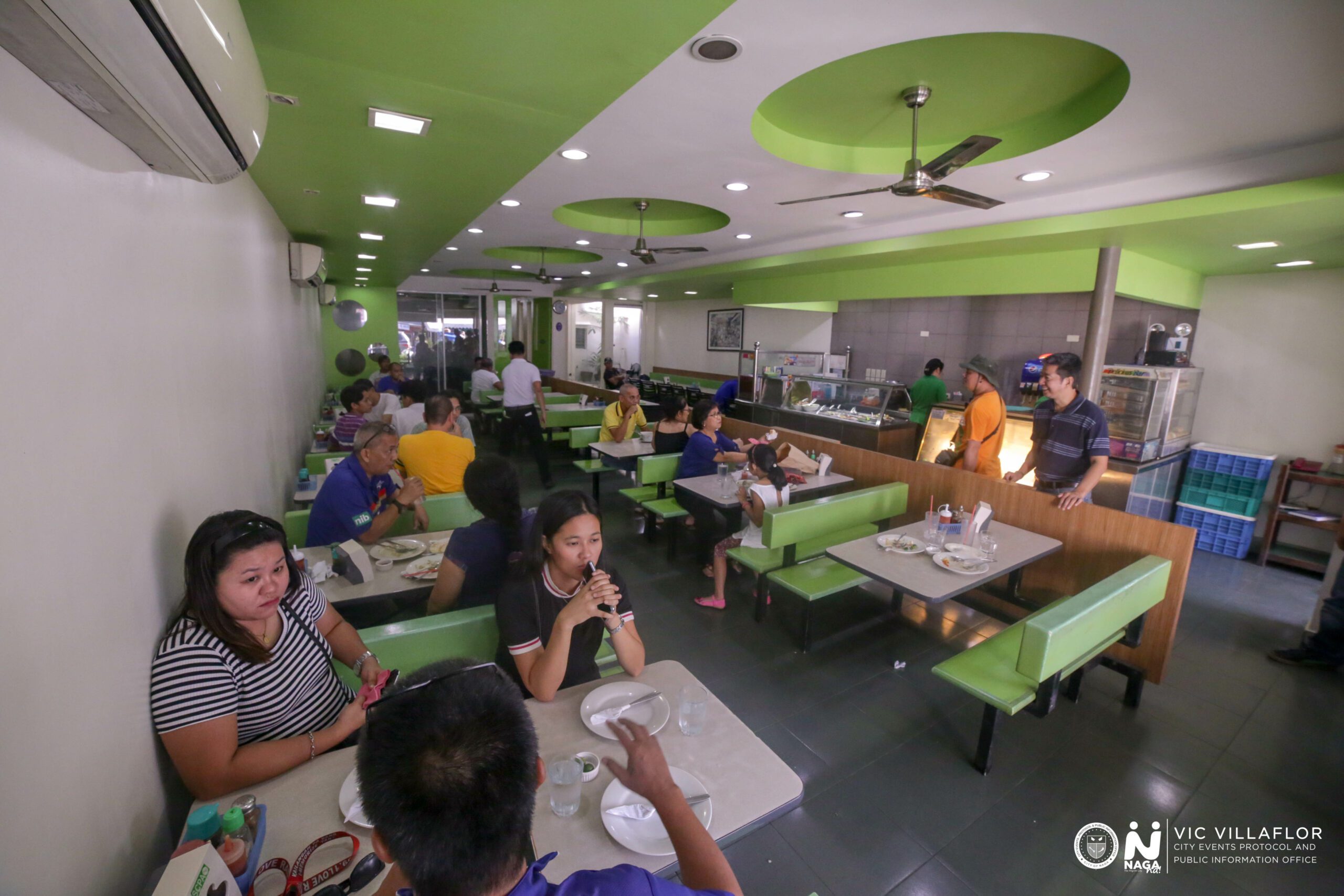 Hungry diners enjoying their lunches on a busy afternoon.