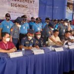 SIGNING Mayor Nelson Legacion (sitting, 4th from left) leads the signing of the memorandum of agreement by and between the Naga City Police Office, the Department of Tourism in Bicol, and LGU Naga. The Agreement seeks to further strengthen their partnership in ensuring the safety and security of local and foreign tourists through the Tourist-Oriented Police for Community Order and Protection (TOPCOP) program. Photo also shows DOT Regional Director Herbie Aguas (sitting, 3rd from right), NCPO chief Col. Nelson Pacalso, and ACTO head Alec Francis Santos (sitting, 2nd and 1st from left, respectively).
