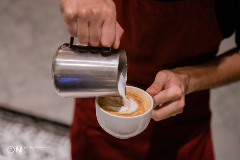 Baristas make coffee art