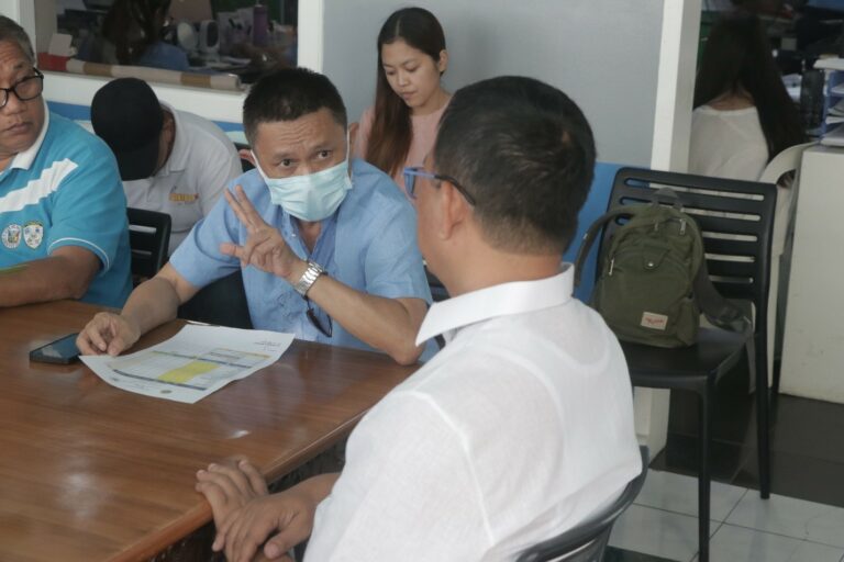 FIRED UP Acting City Health Officer Ronaldo Amoranto, M.D. (at the middle) briefs Mayor Nelson Legacion (back to the camera) on the recent cases of Covid-19 a day after the IATF places the entire city under the Alert Level 1 status. At Amoranto’s right is Ernesto Elcamel, chief of the City Disaster Risk Reduction Management Office. REY BAYLON/CEPPIO