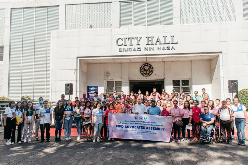 OATH-TAKING | The officers and members of the Naga City PWD Vendors Association and the Naga City PWD Youth Association after the swearing-in rite on Monday, June 10, this year. Photo also shows the Sangguniang Panlungsod members, City Administrator Elmer Baldemoro, and Atty. PJ Barrosa, PDAO Head.